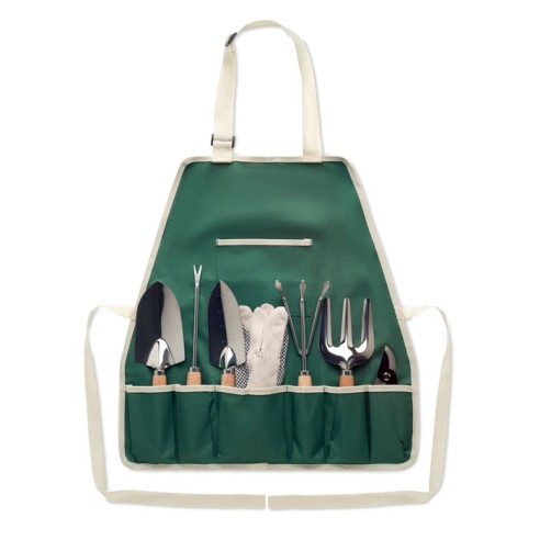 Garden tools in apron GREENHANDS